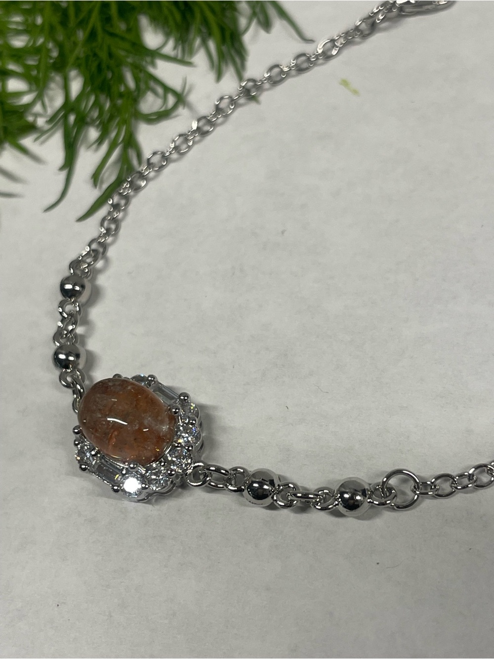 Silver Chain Bracelet with Orange Sunstone Center
